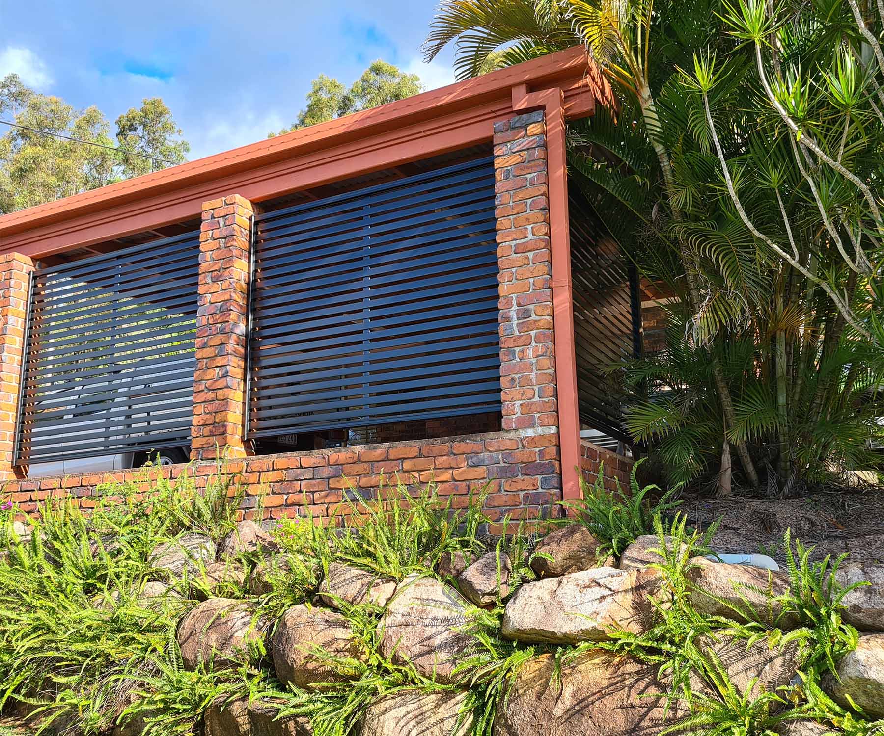 COLORBOND Carport Screen panels in Deep Ocean between brick piers