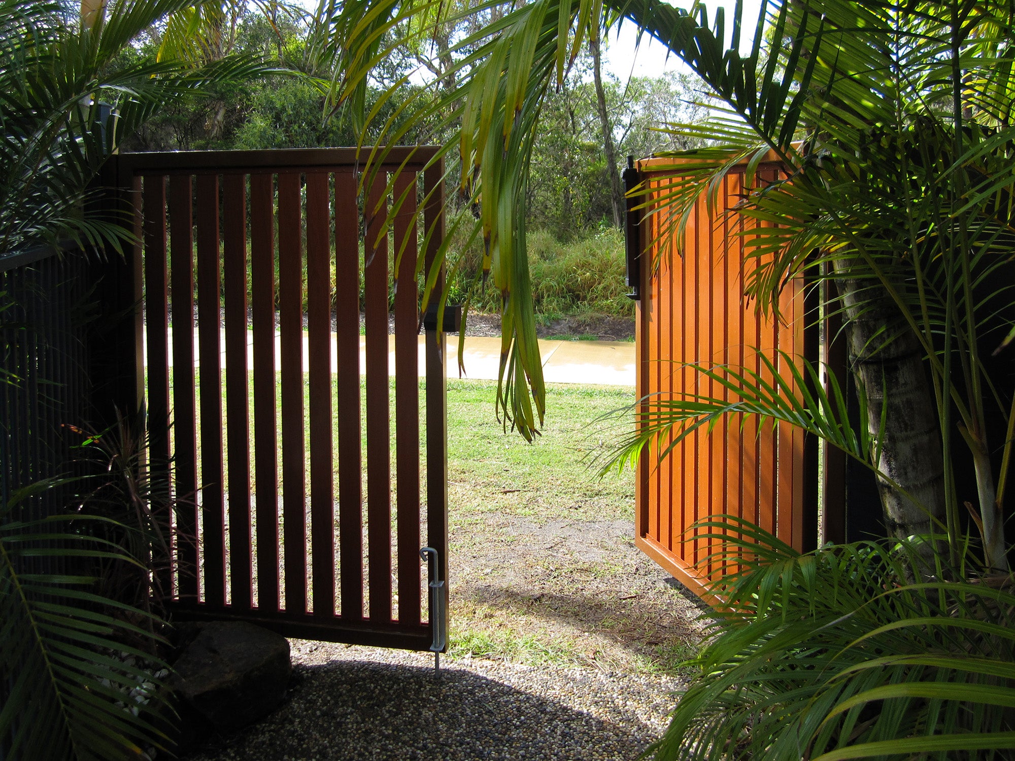 Vertical Slat Woodgrain Driveway Gate