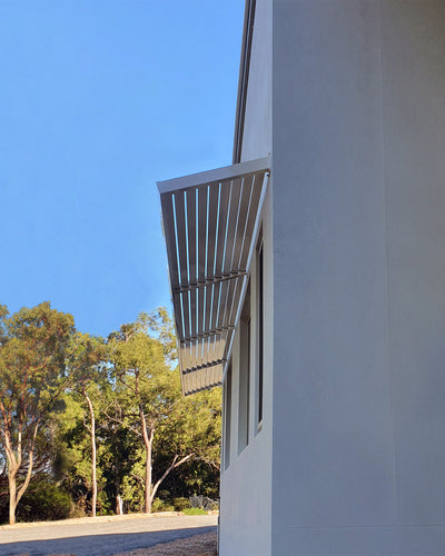 Clik'n'Fit Louvre Aluminium Awning at a 20° Angle in Dune powder coat.